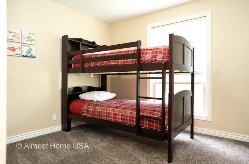 Single bunk bed in bedroom in furnished home located in Sandy Utah.