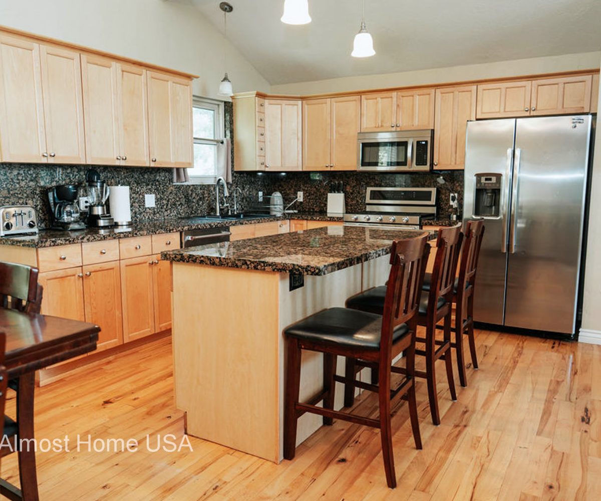 Fully equipped kitchen in furnished home located in Sandy Utah.