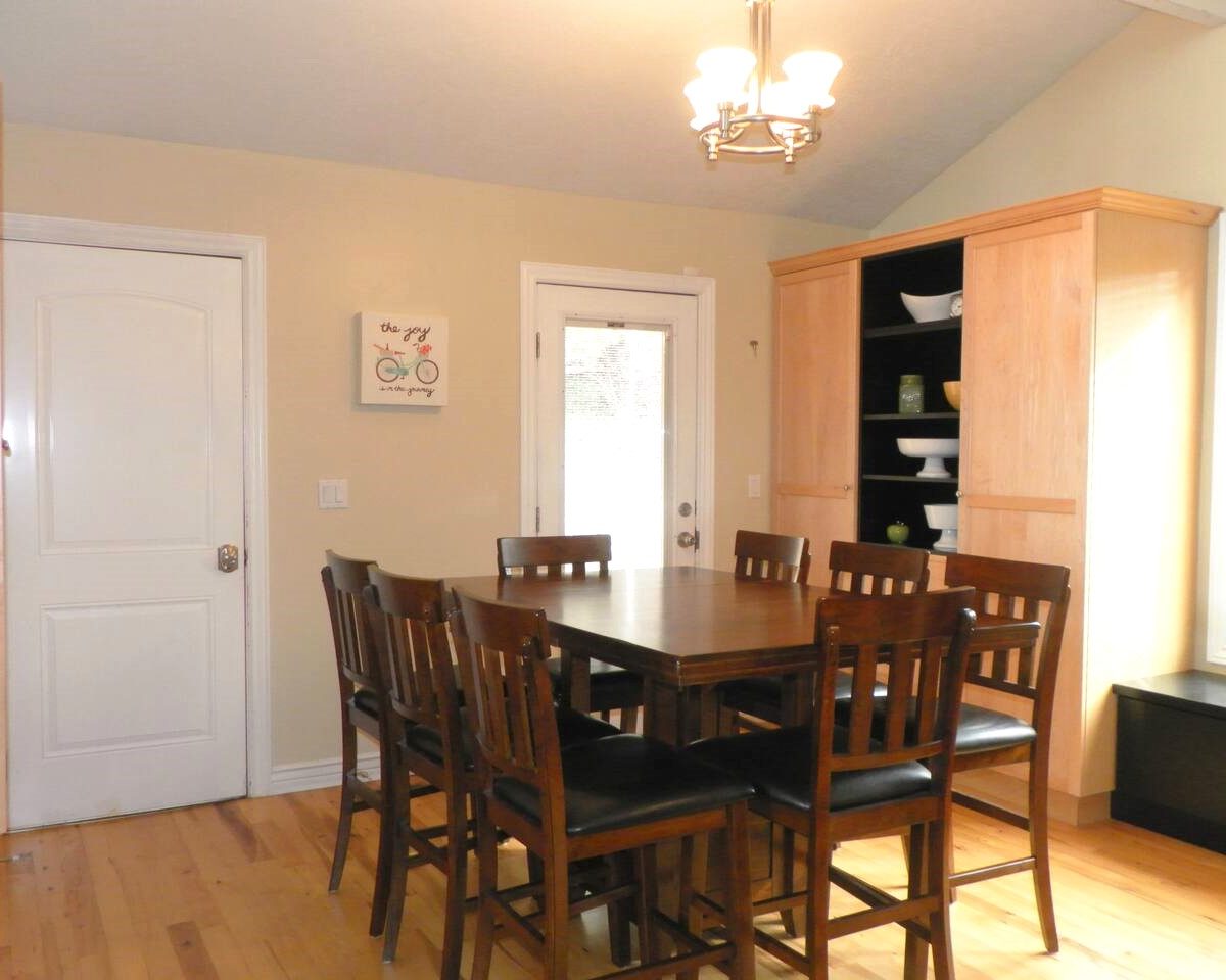 Dining table in furnished home located in Sandy Utah.