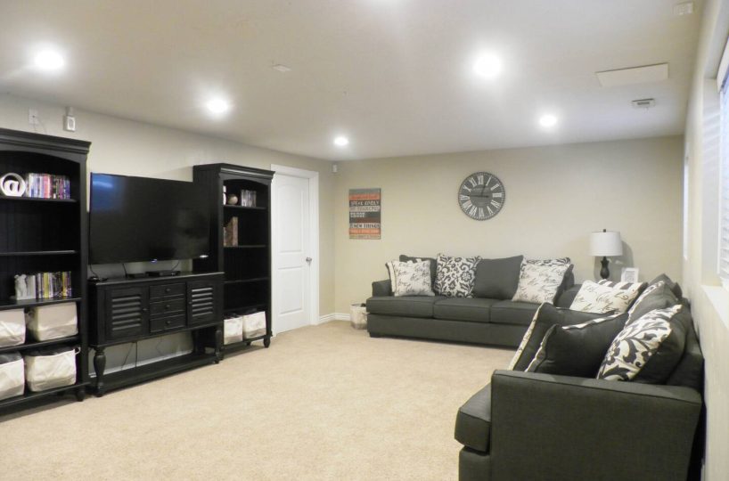 Sofas in furnished family room in furnished home in Sandy Utah.