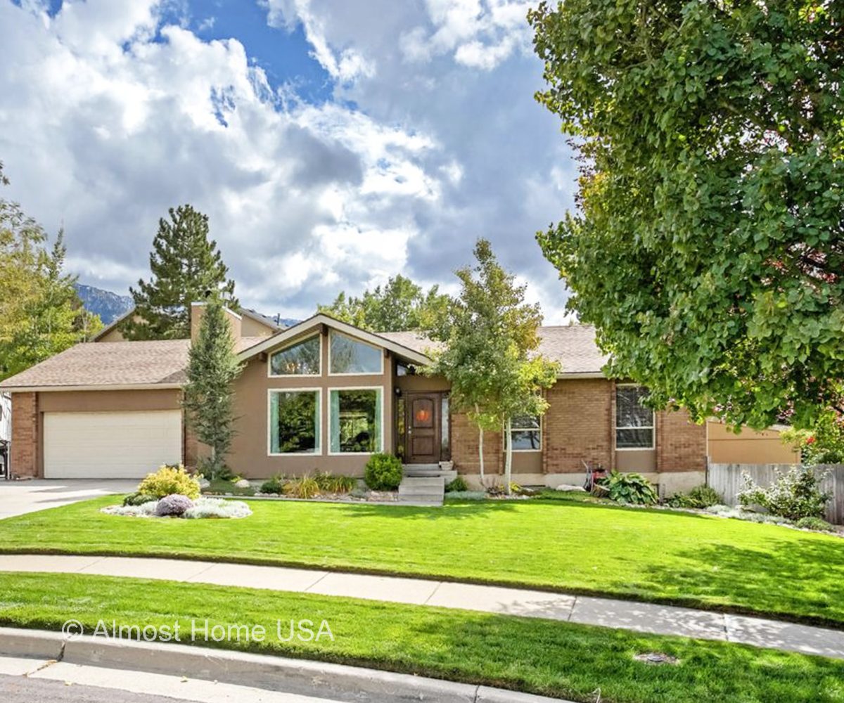 Front exterior of furnished home located in Sandy Utah.