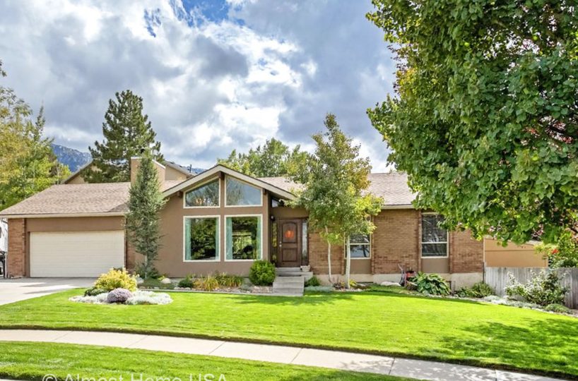 Front exterior of furnished home located in Sandy Utah.
