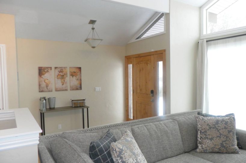 Front entry door in furnished home located in Sandy Utah.