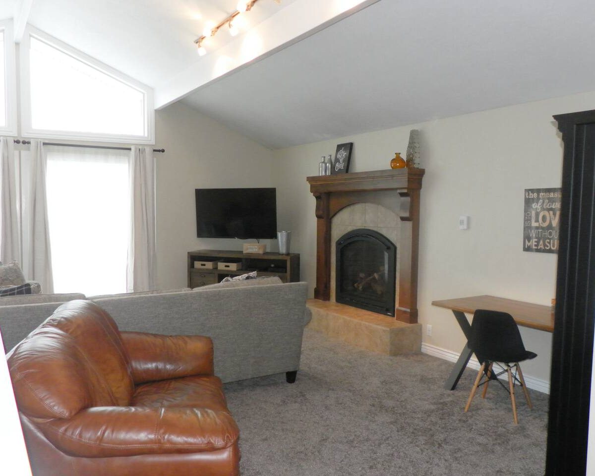 Smart TV in living room in furnished home located in Sandy UT