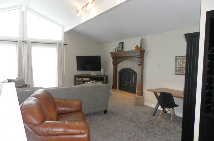 Smart TV in living room in furnished home located in Sandy UT