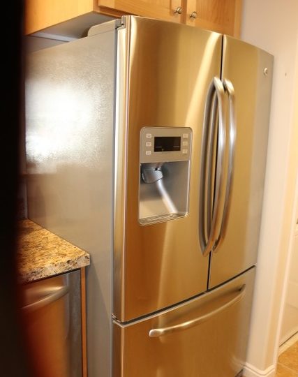 Stainless Steel Fridge in furnished condo in Salt Lake City.