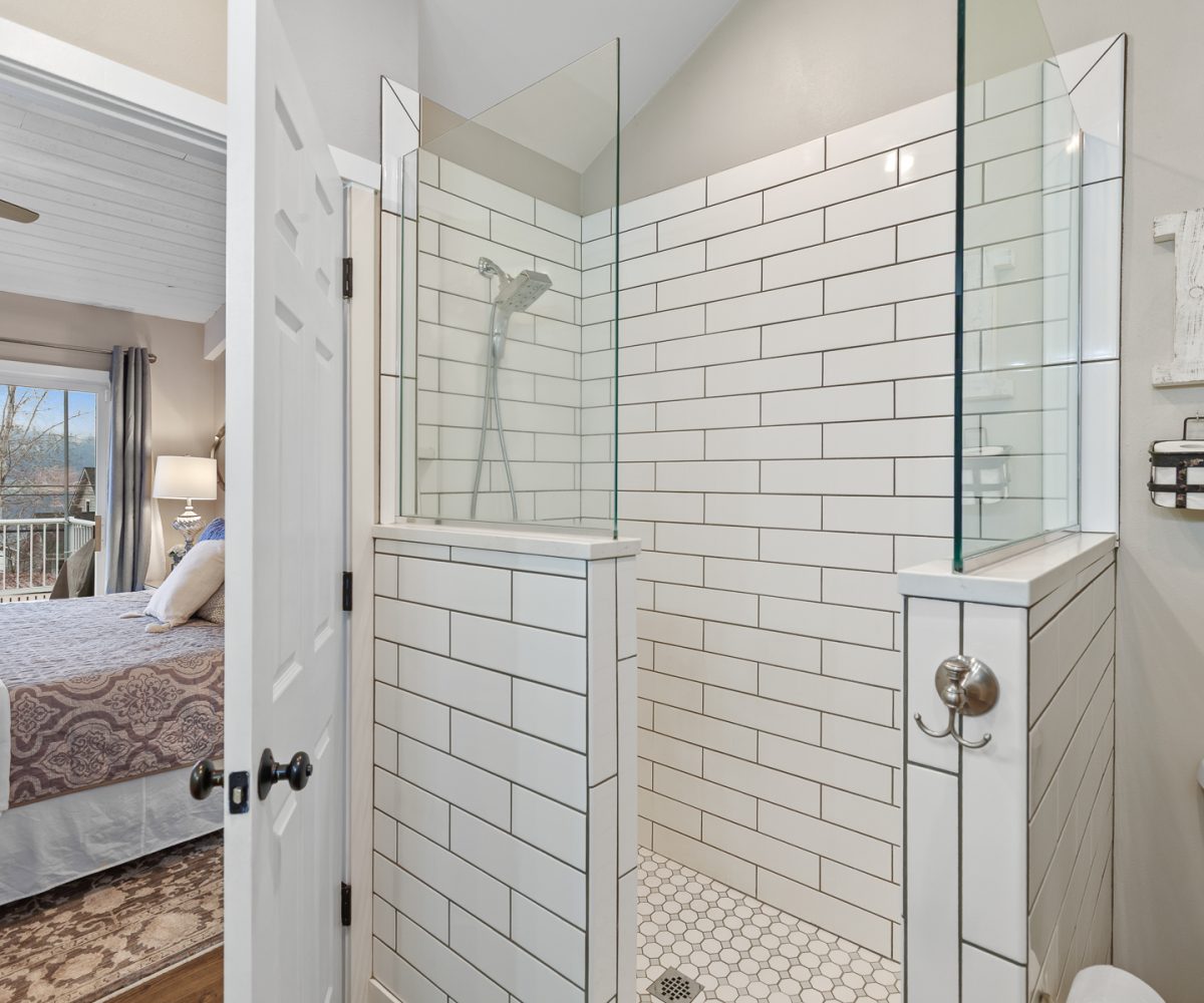 Walk-in shower in furnished home located in Liberty Lake, WA.