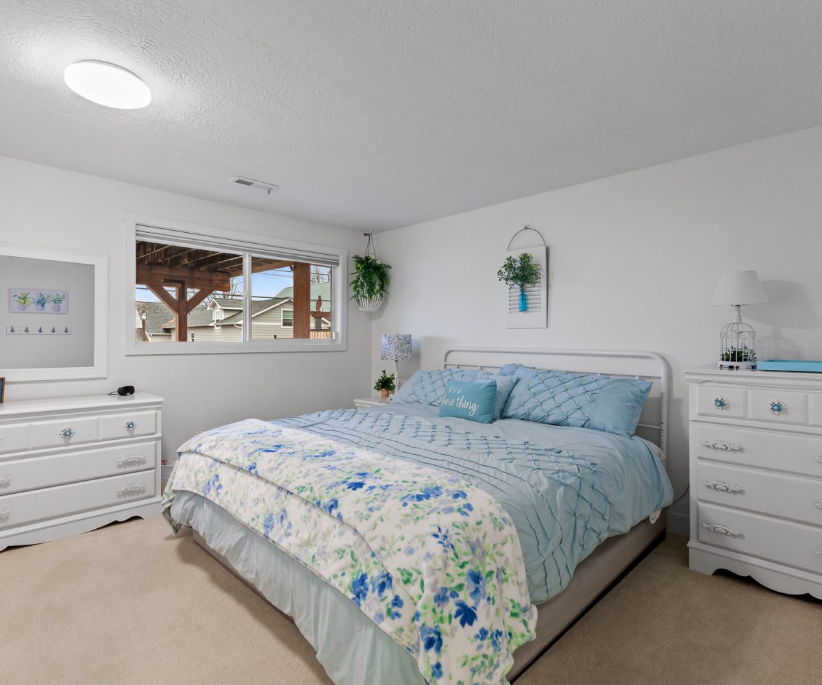 Queen bed in furnished home located in Liberty Lake, WA.