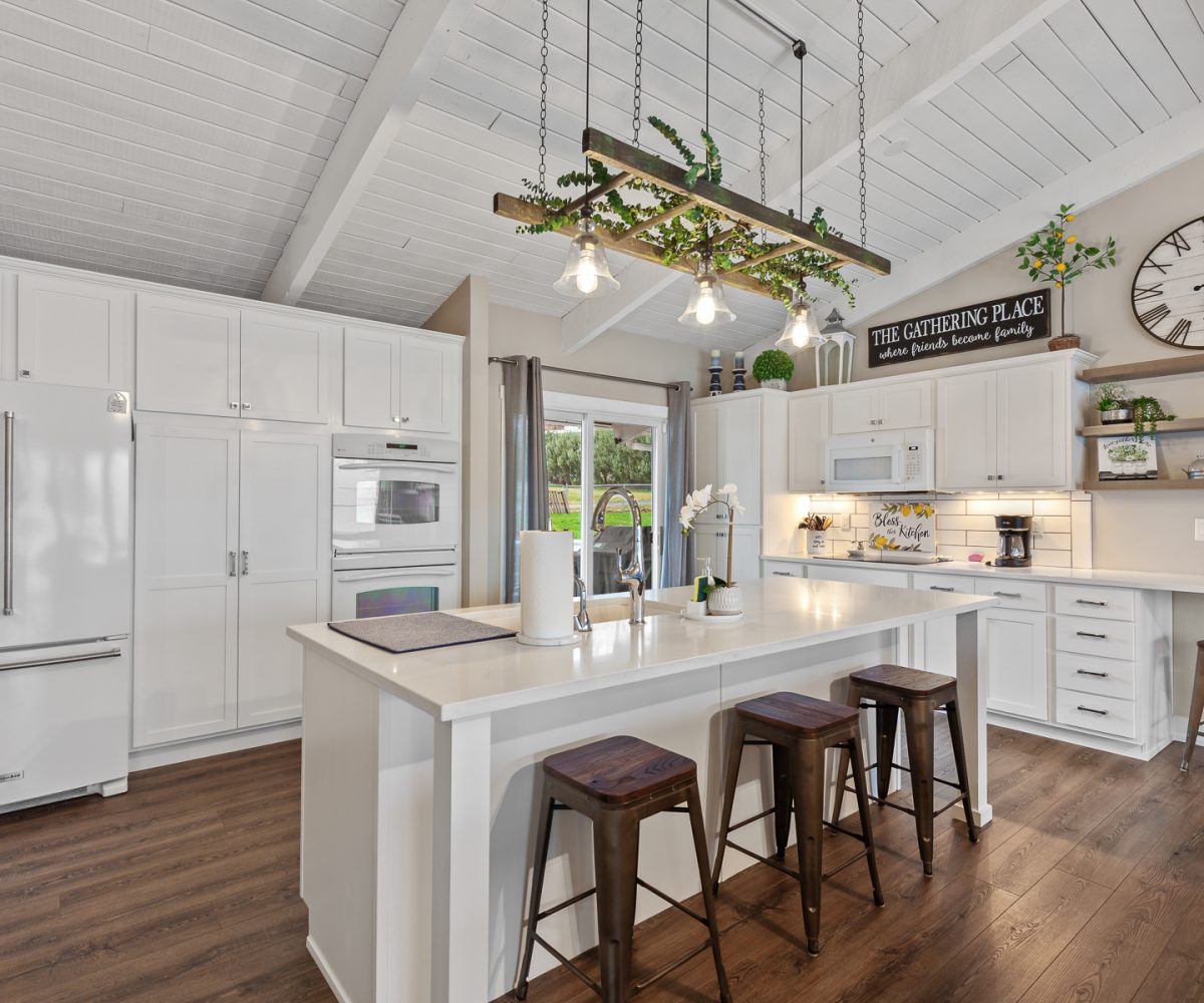 Large kitchen island in furnished home located in Liberty Lake, WA.