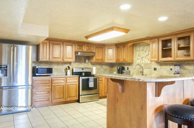 Fully equipped kitchen with stainless steel appliances in Ogden, UT.