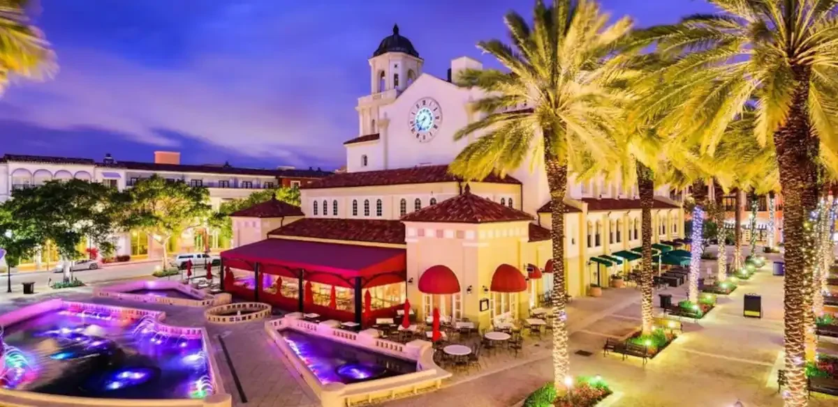 Nighttime view of shops located in West Palm Beach, FL.