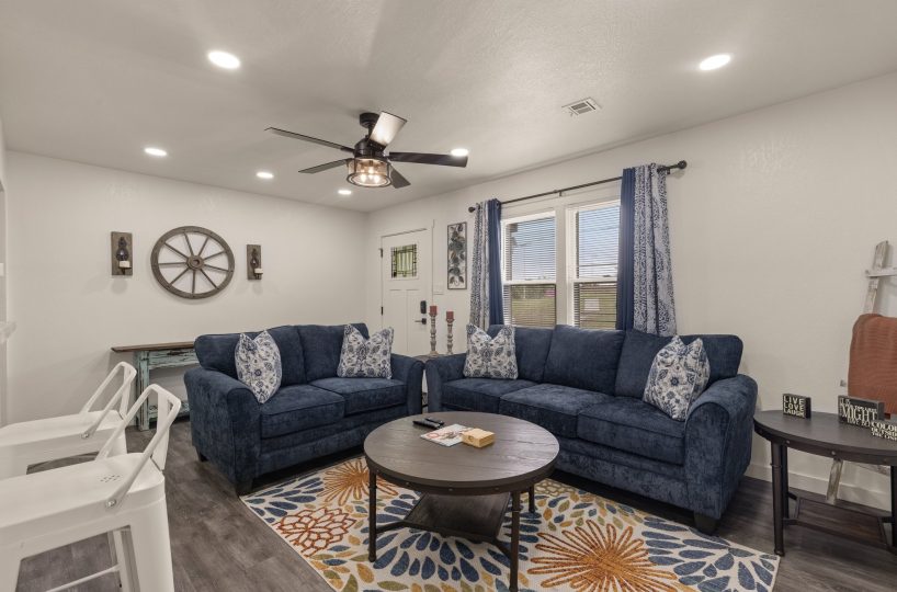 Seating area in furnished living room in furnished home in Tulsa, OK.