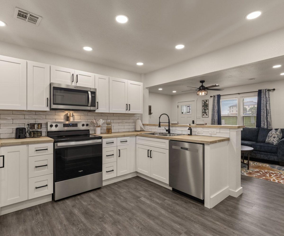 Stainless steel appliances in furnished home located in Tulsa, OK.