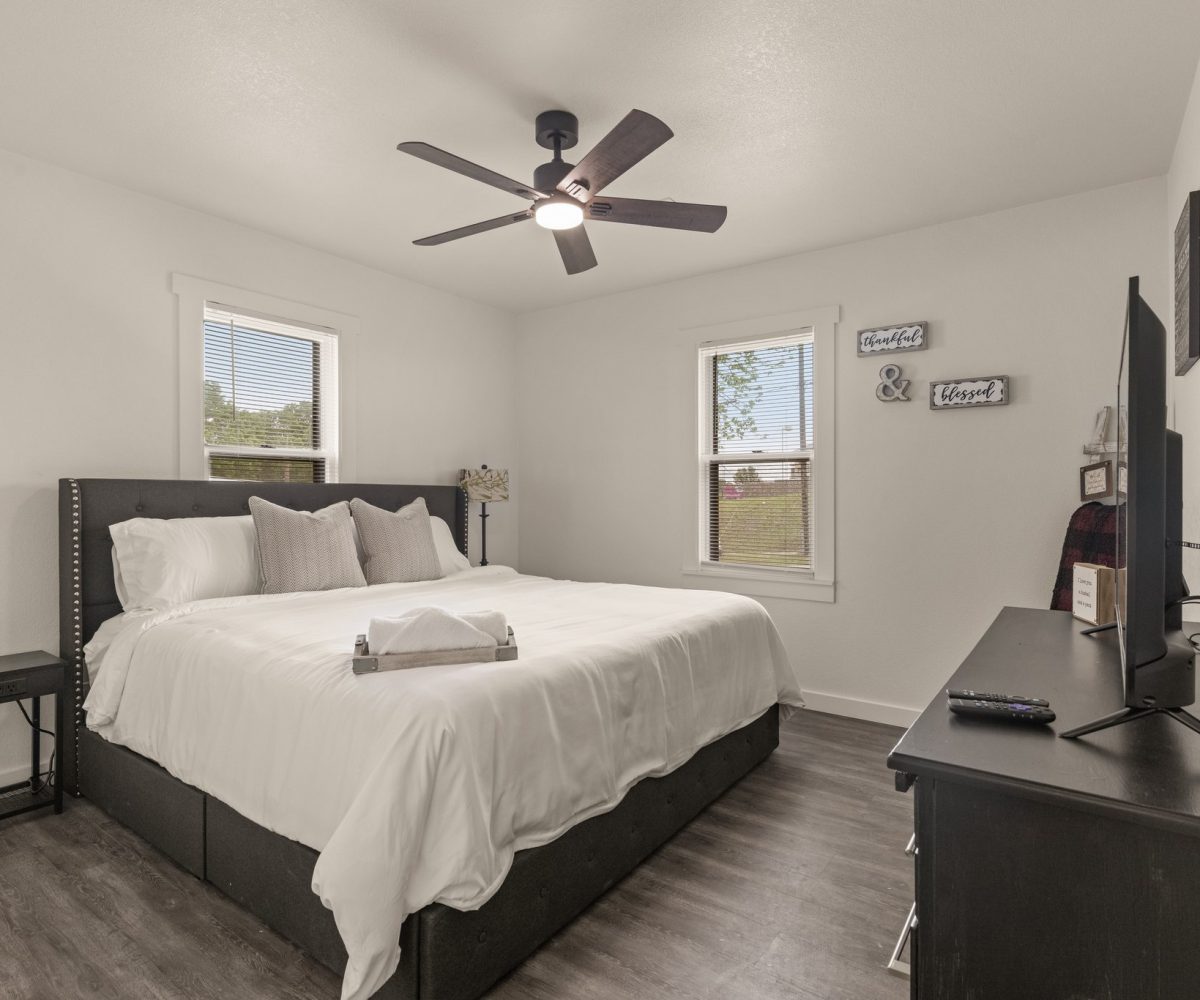 Master bedroom in furnished home in Tulsa, OK.