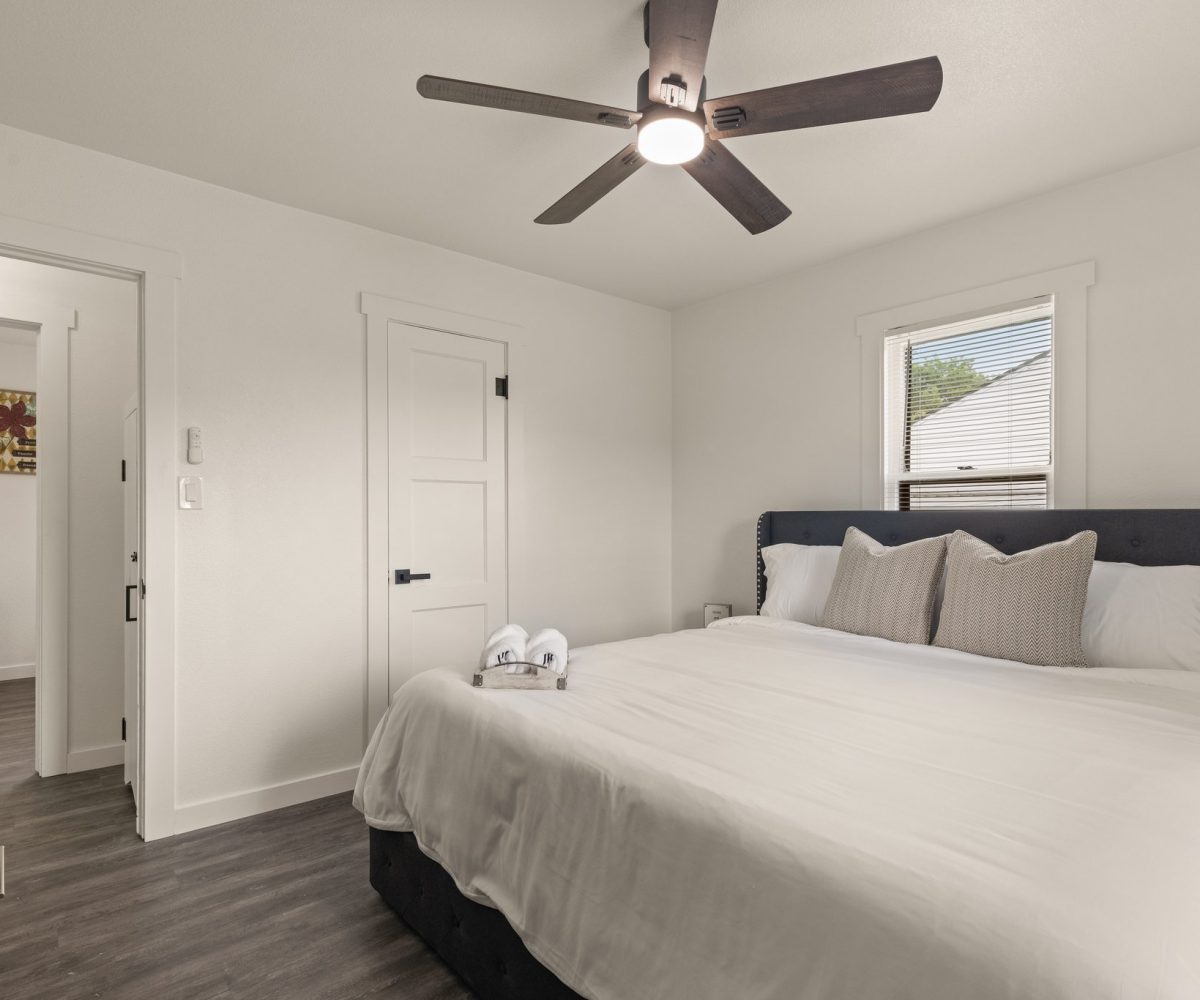 Closet in master bedroom of furnished home in Tulsa, OK.