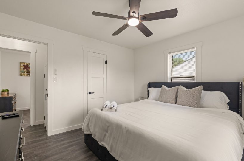 Closet in master bedroom of furnished home in Tulsa, OK.