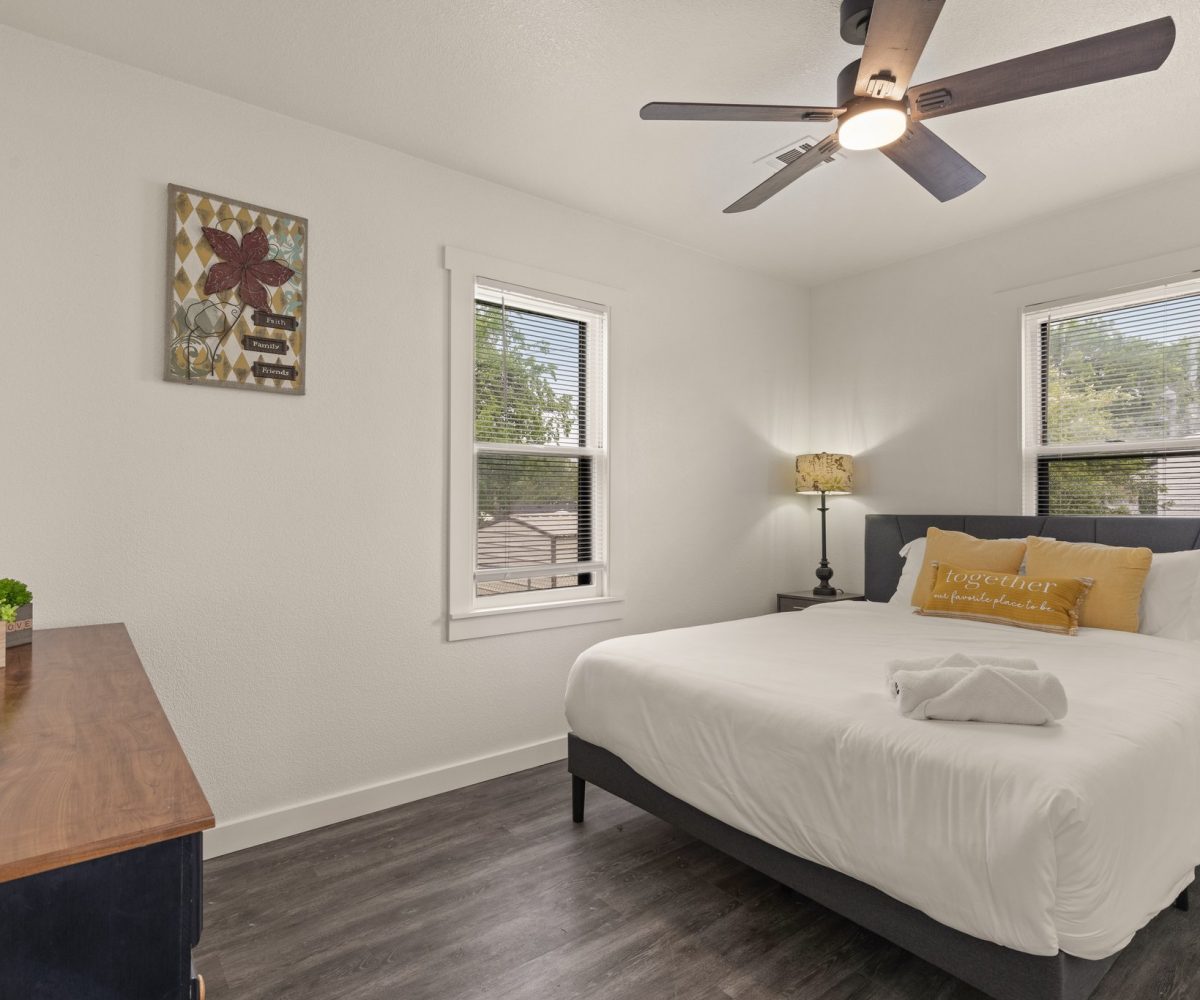 Second bedroom in furnished home located in Tulsa, OK.