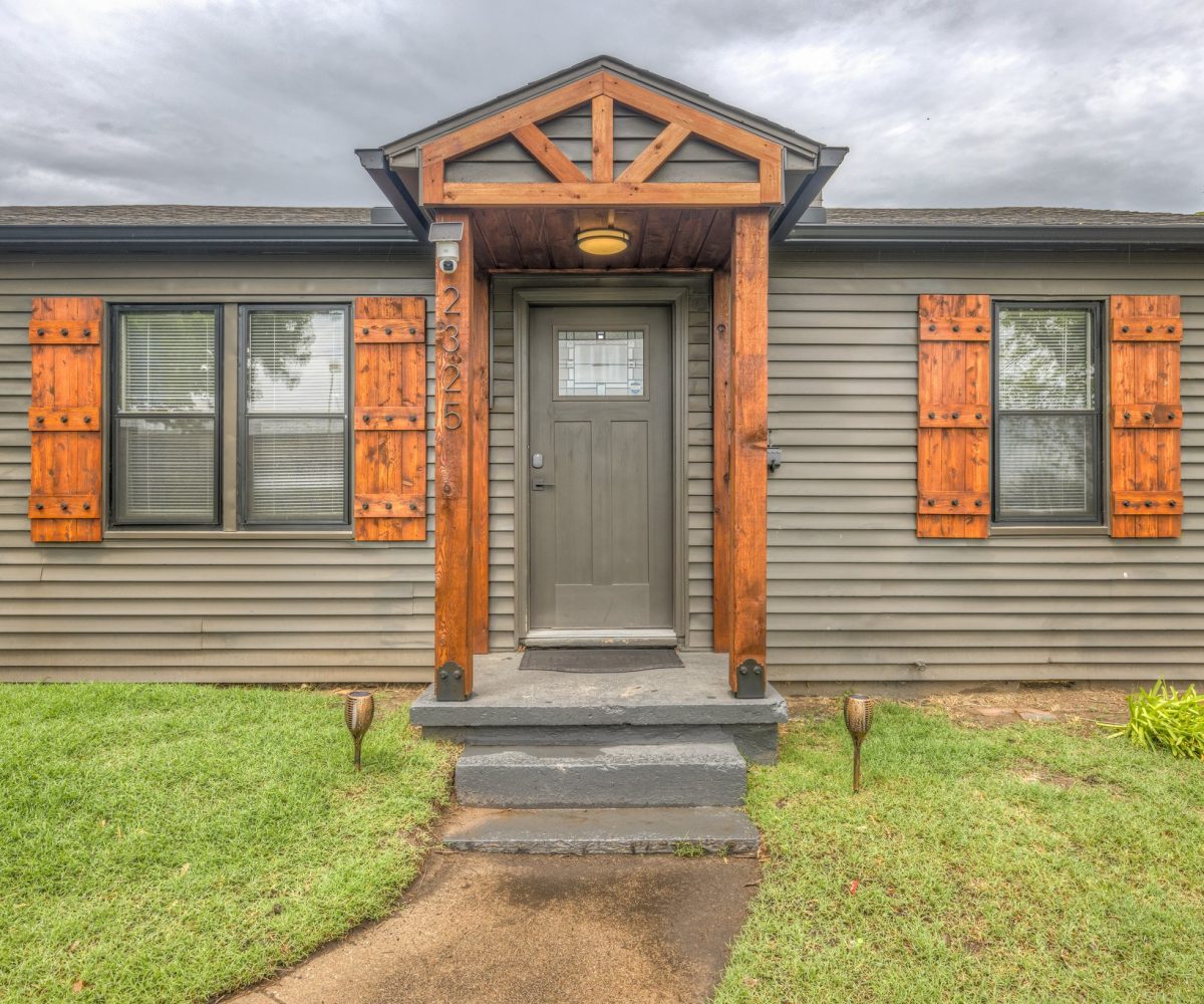 Closeup view of front entry of furnished home in Tulsa, OK.