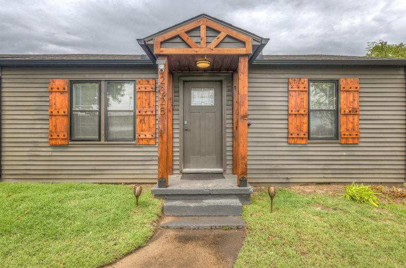 Closeup view of front entry of furnished home in Tulsa, OK.
