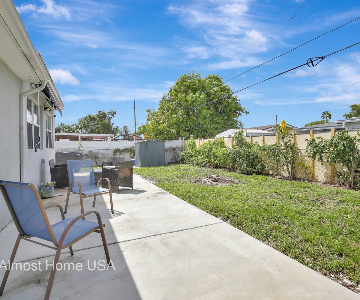 Fenced backyard at furnished home near Miami, FL.