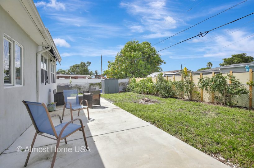 Fenced backyard at furnished home near Miami, FL.