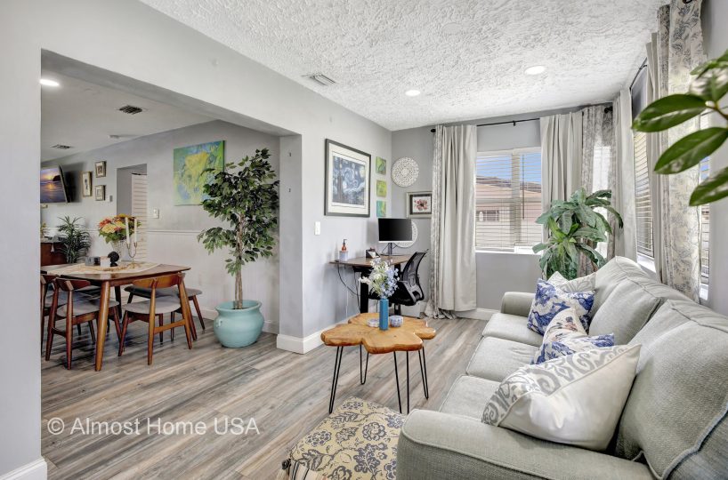 Updated living room in furnished home located in Miami, FL.