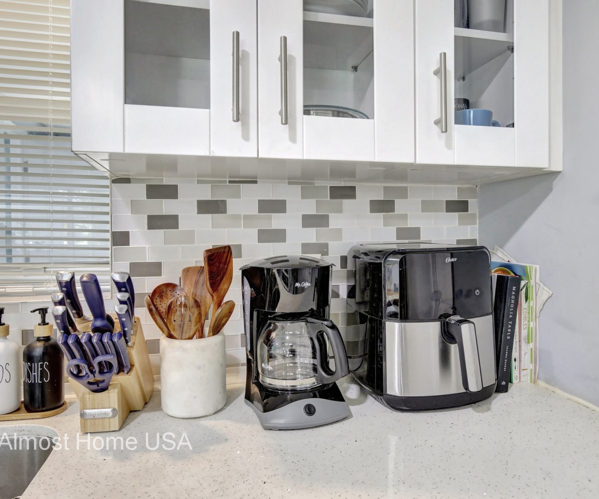 Kitchen housewares in furnished home located in Miami, FL.