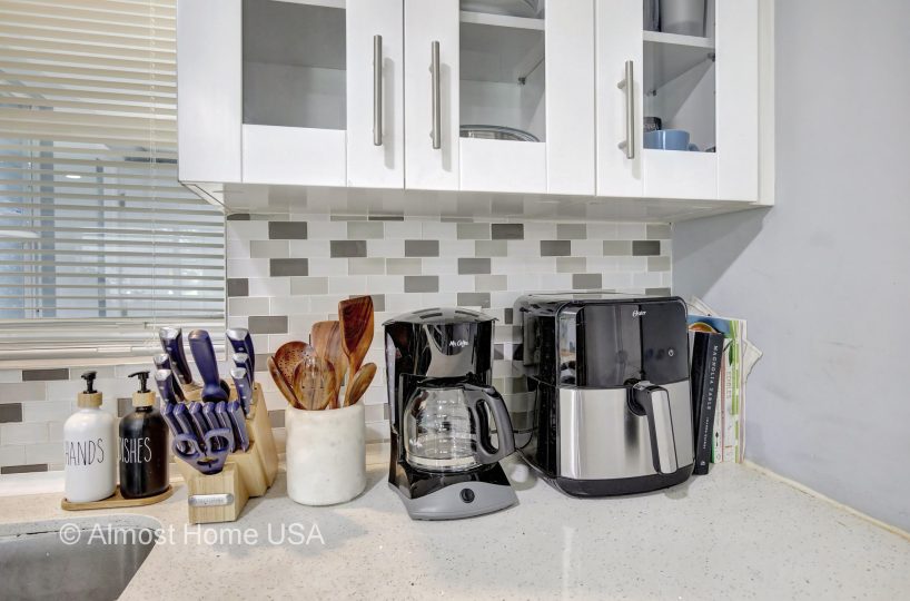 Kitchen housewares in furnished home located in Miami, FL.
