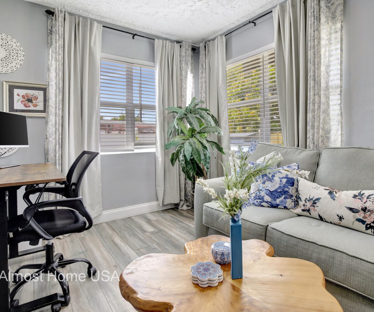 Comfortable living room in furnished home located in Miami, FL.