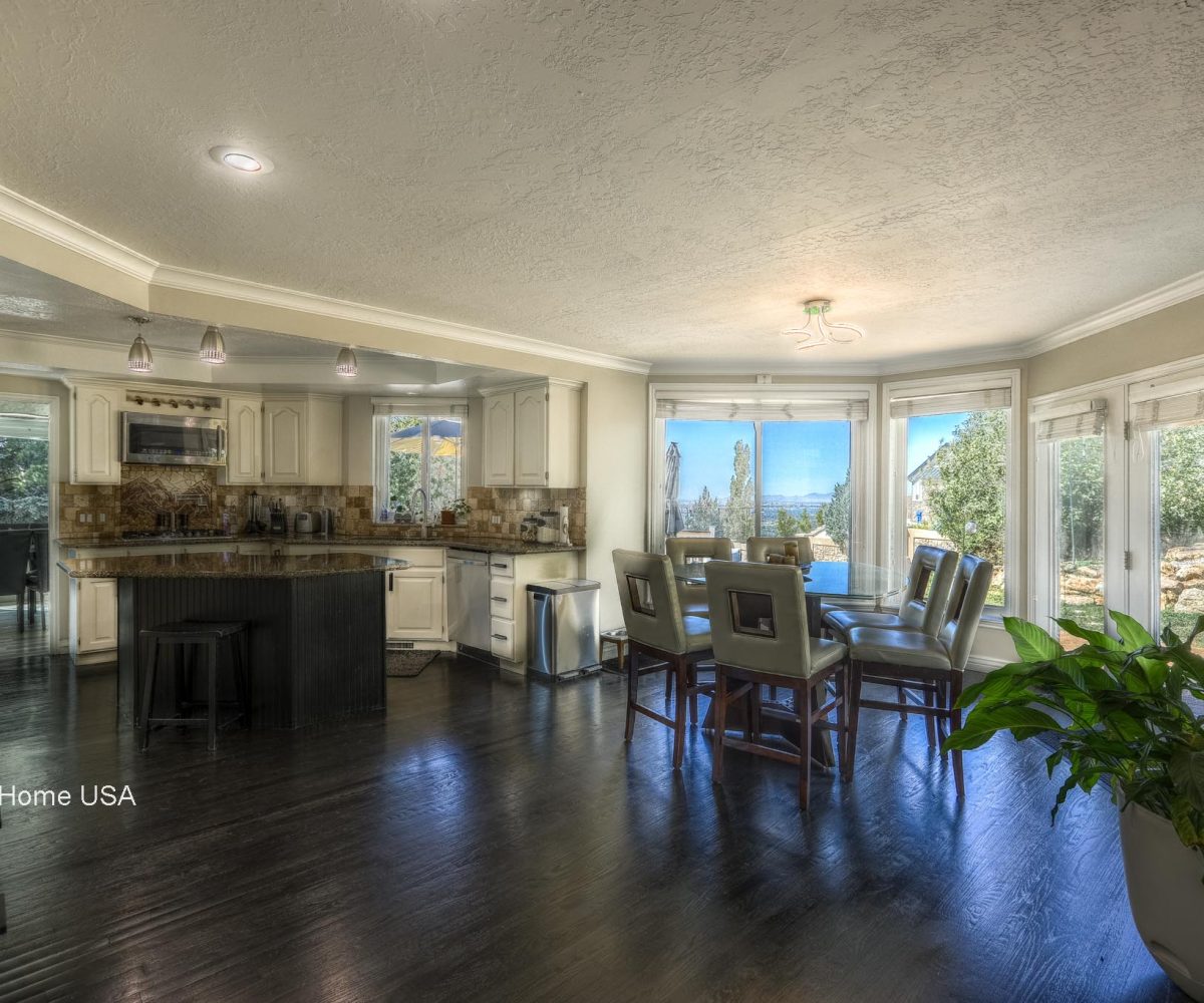 Mountain view from dining area in furnished 5 bedroom home in Holladay, UT.