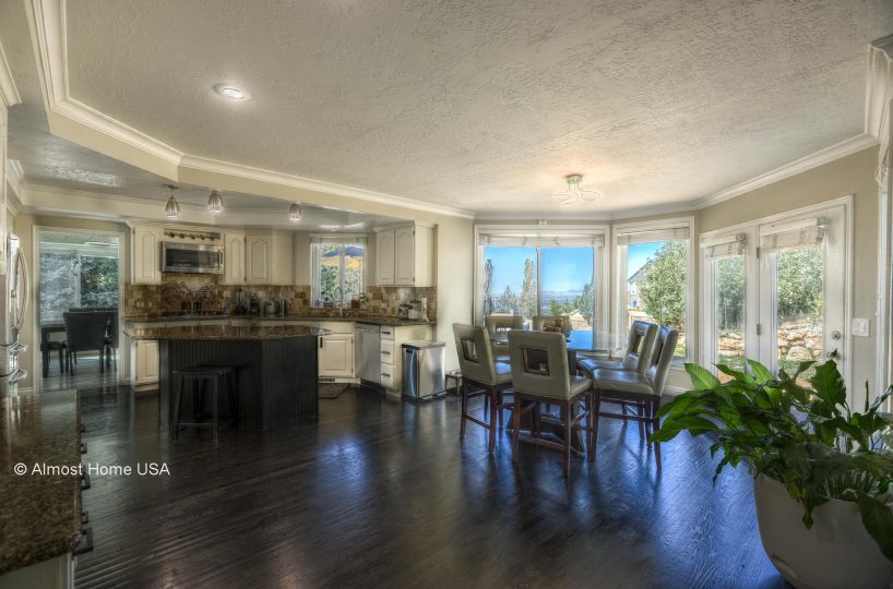Mountain view from dining area in furnished 5 bedroom home in Holladay, UT.