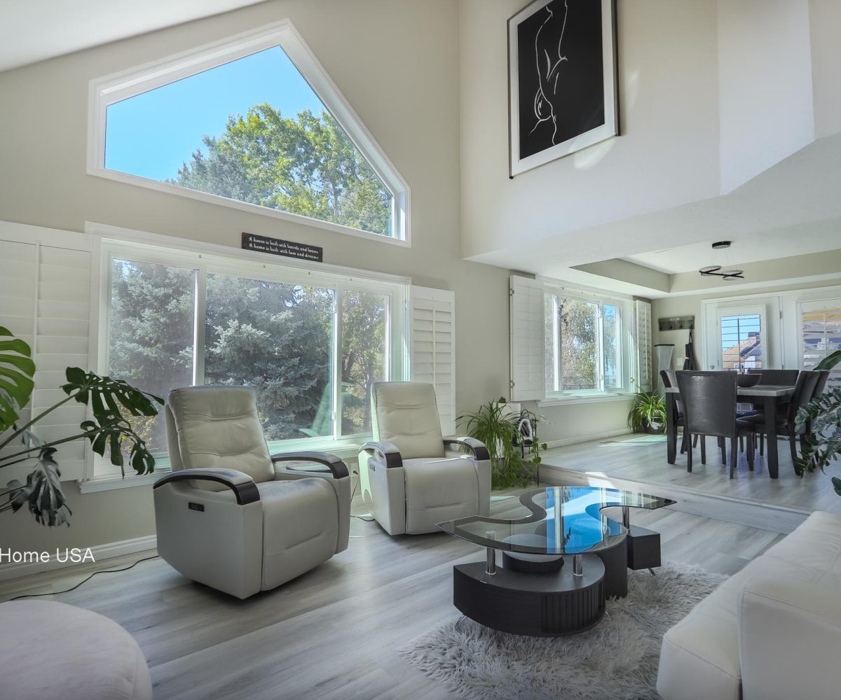 Living area in furnished 5 bedroom home in Holladay, UT.