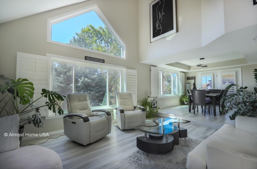 Living area in furnished 5 bedroom home in Holladay, UT.