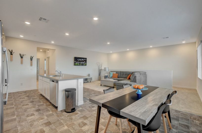 Dining table and Smart TV view in furnished townhome located in Henderson, NV.
