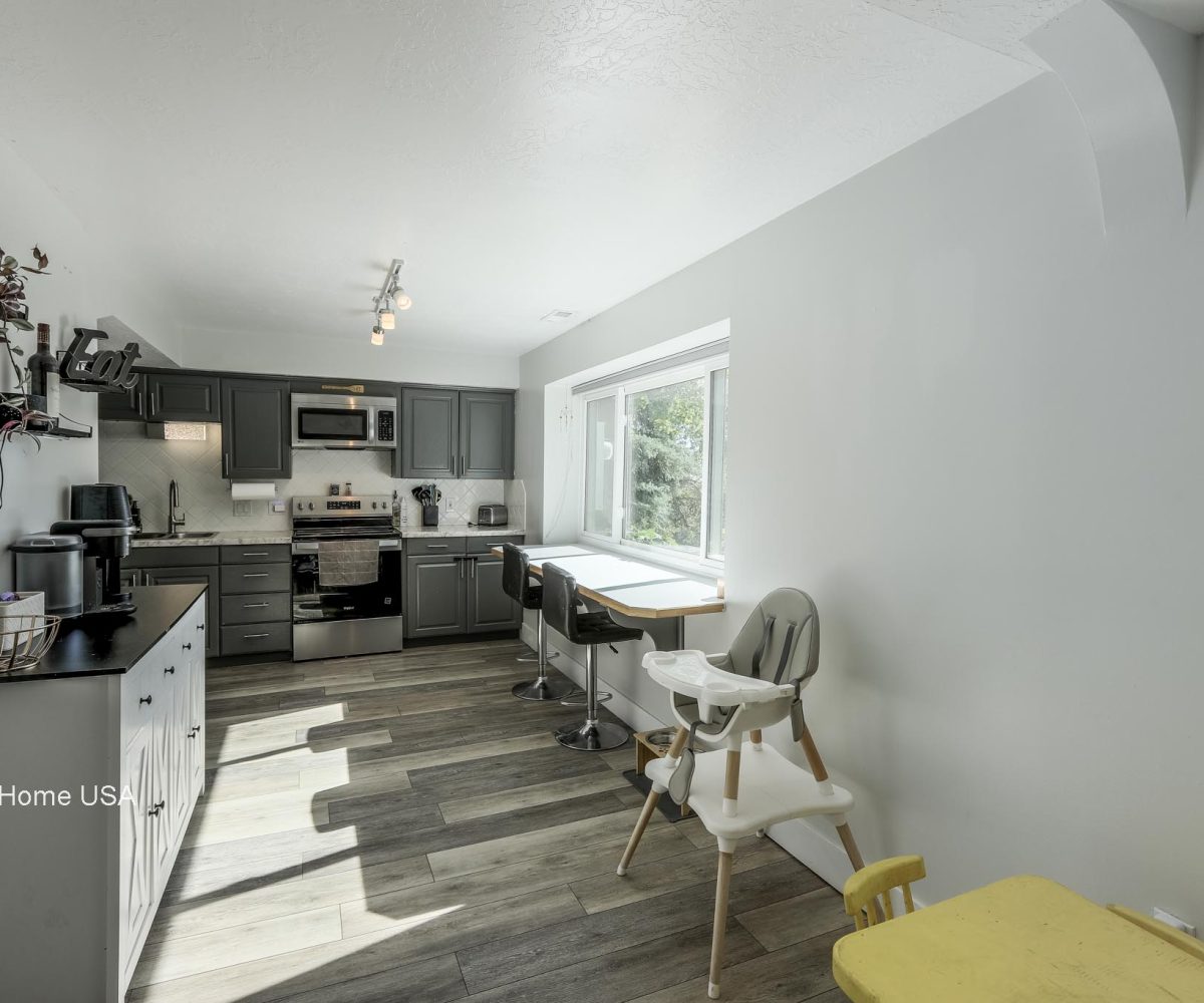 Downstairs kitchen in furnished 5 bedroom home in Holladay, UT.