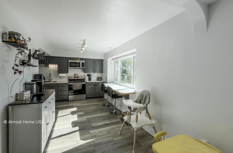 Downstairs kitchen in furnished 5 bedroom home in Holladay, UT.