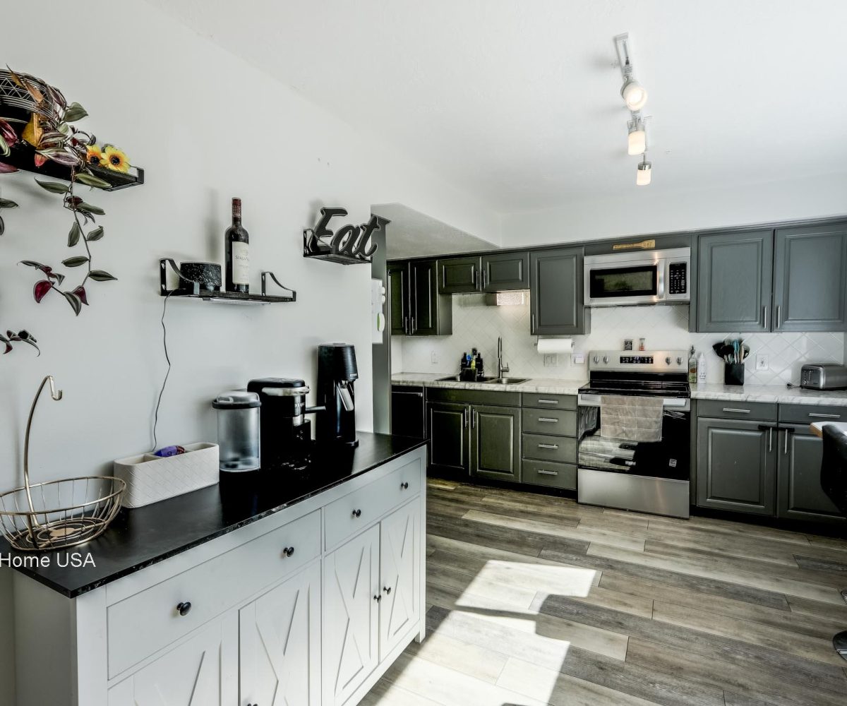 Designer kitchen in furnished 5 bedroom home in Holladay, UT.