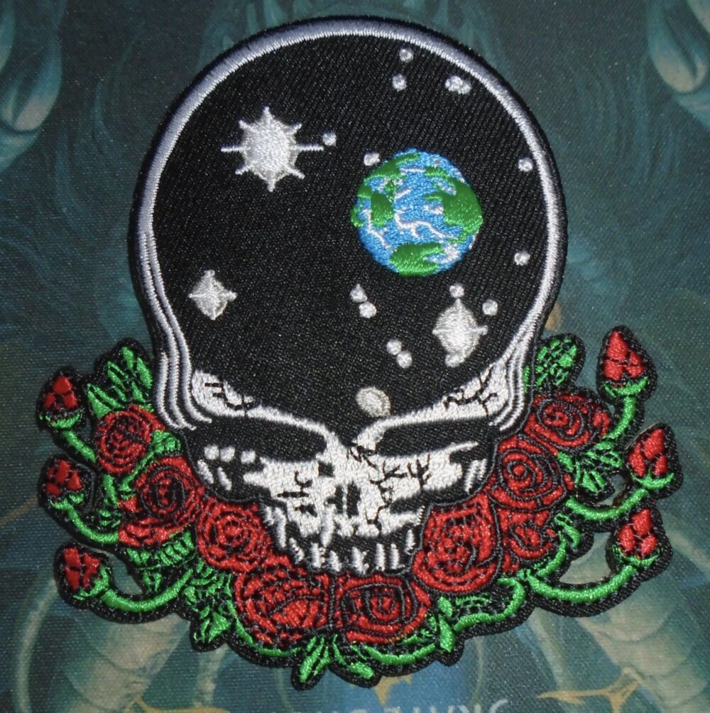 Deadhead Embroidered Space Your Face Patch with cosmic skull, Earth, stars, and red roses