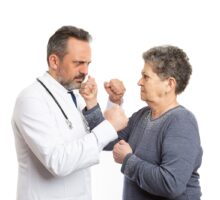 Angry doctor fights with older woman