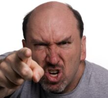 Very angry man pointing finger in anger