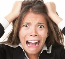 stressed out woman pulling her hair