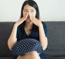young woman with sinus congestion
