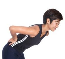 woman with lower back pain, sore back