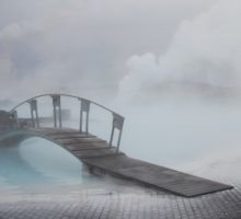 This is a bridge over the beautiful blue nutrient rich geothermal water of the Blue Lagoon in Iceland