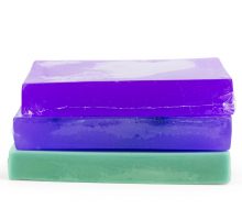 green, blue and violet bars of soap