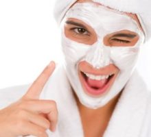 Woman with facial mask of milk of magnesia