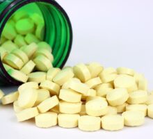 folic acid or folate pills with green bottle
