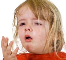 child coughing with the flu or a cold