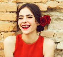 girl with braces and red lipstick
