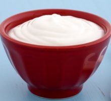 red bowl of Greek yogurt